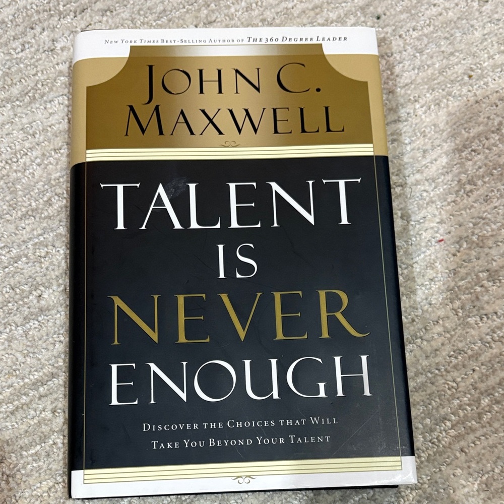 'Talent is Never Enough' Book - Black and Gold Cover